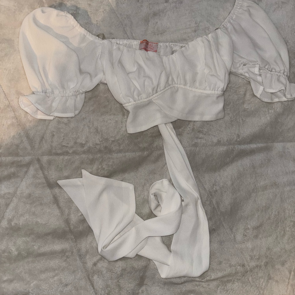 white off the shoulder crop top. ribbon to tie a bow